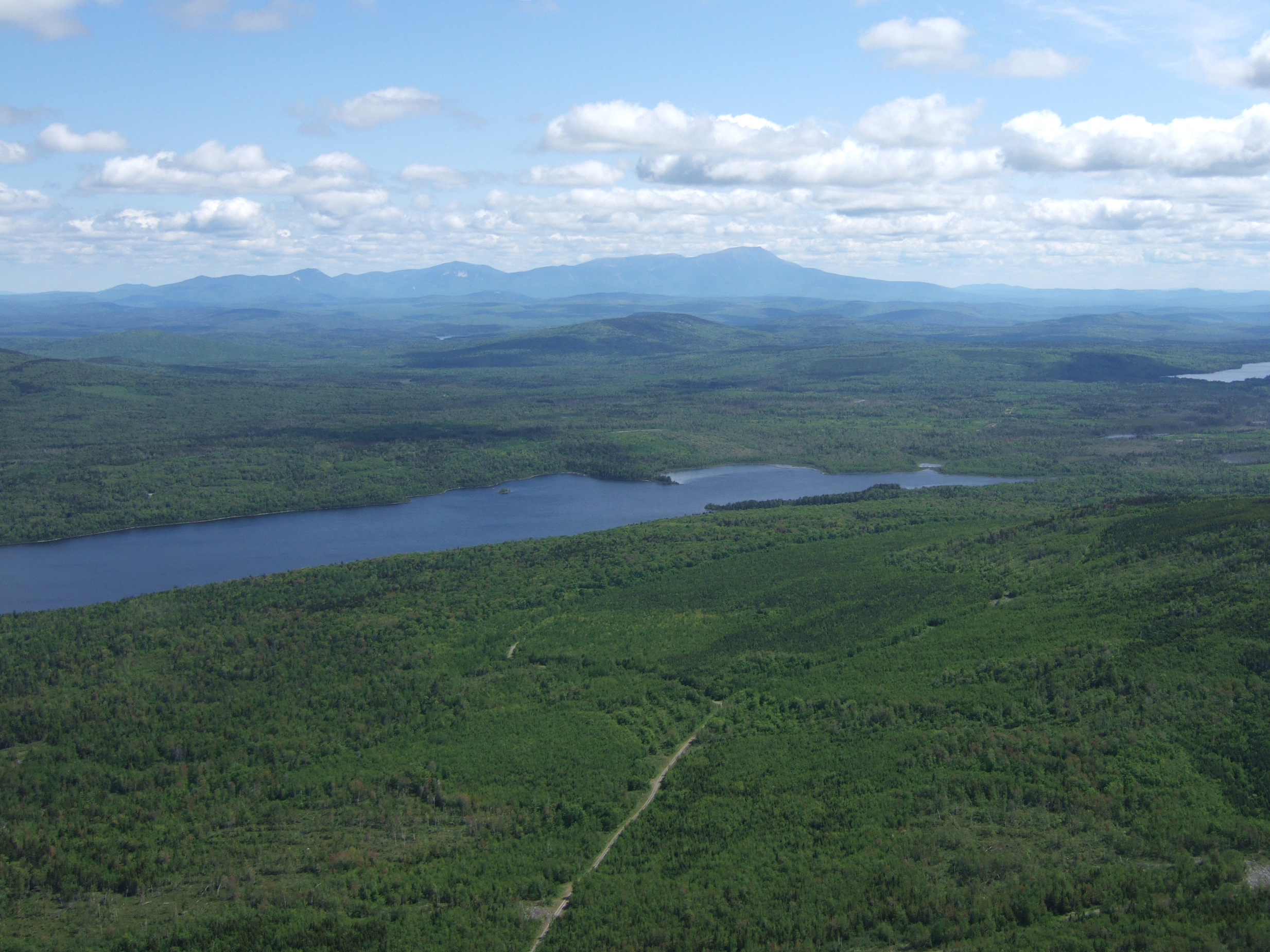 Aerial shot of Second RoachPond, in the Maine Woods Initiative. Photo by Marc Chalufour