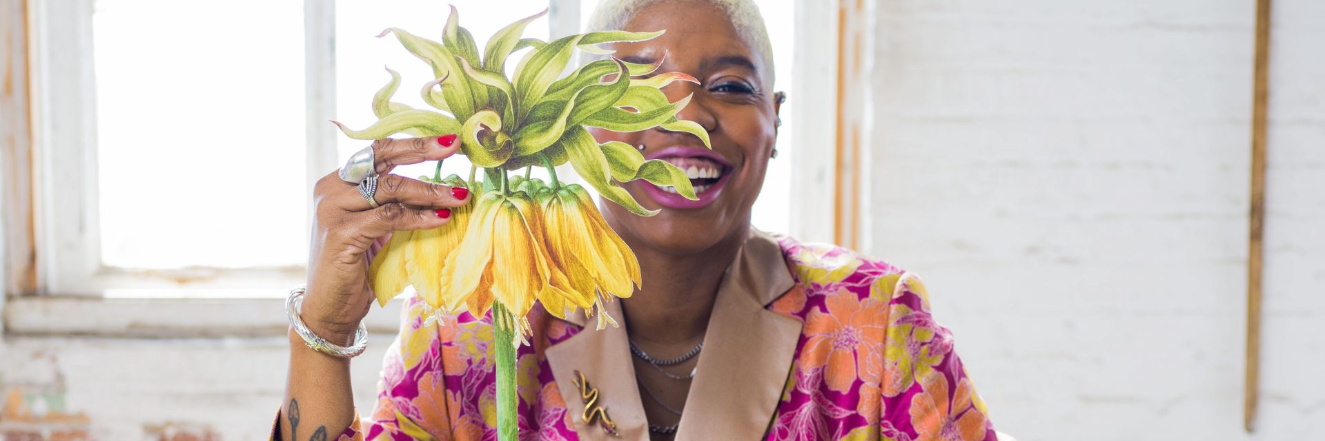 African American woman with flower